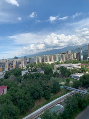 Mountains and River view apartment in Almaty